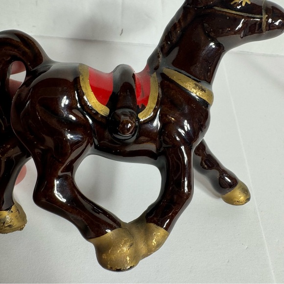 Vintage small brown ceramic horse figurine featuring gold trim and a red saddle. - Picture 6 of 10
